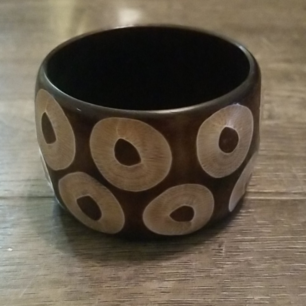 Brown and tan bangle bracelet.
